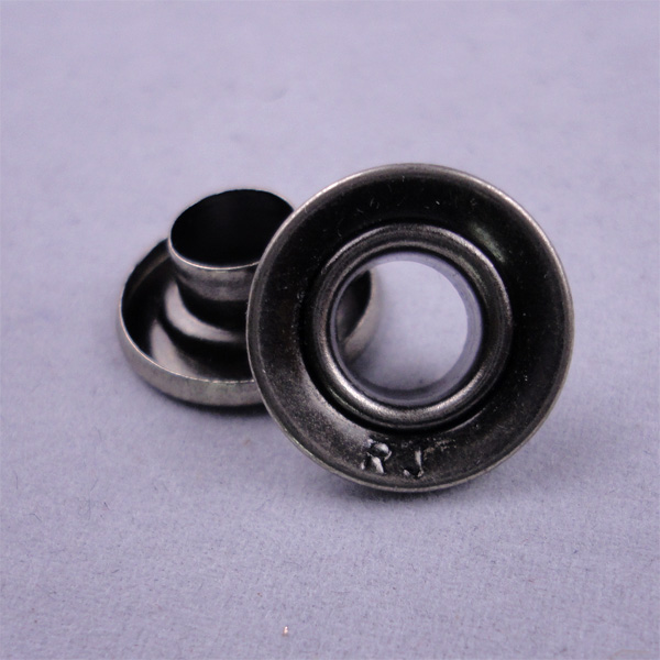 garment eyelets button